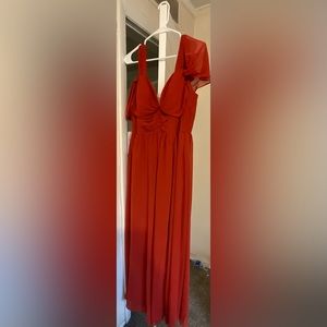 Bridesmaid dress.Dress still has tags. Never worn no alterations done.